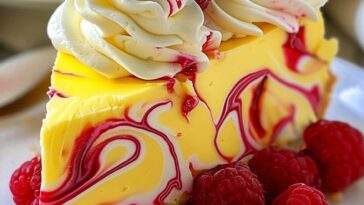 Luscious Lemon Raspberry Swirl Cheesecake