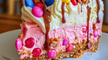 Pink Paradise No-Bake M&M Peanut Butter Cheesecake