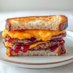 Sausage, Egg, and Cheese Sandwich with Grape Jelly